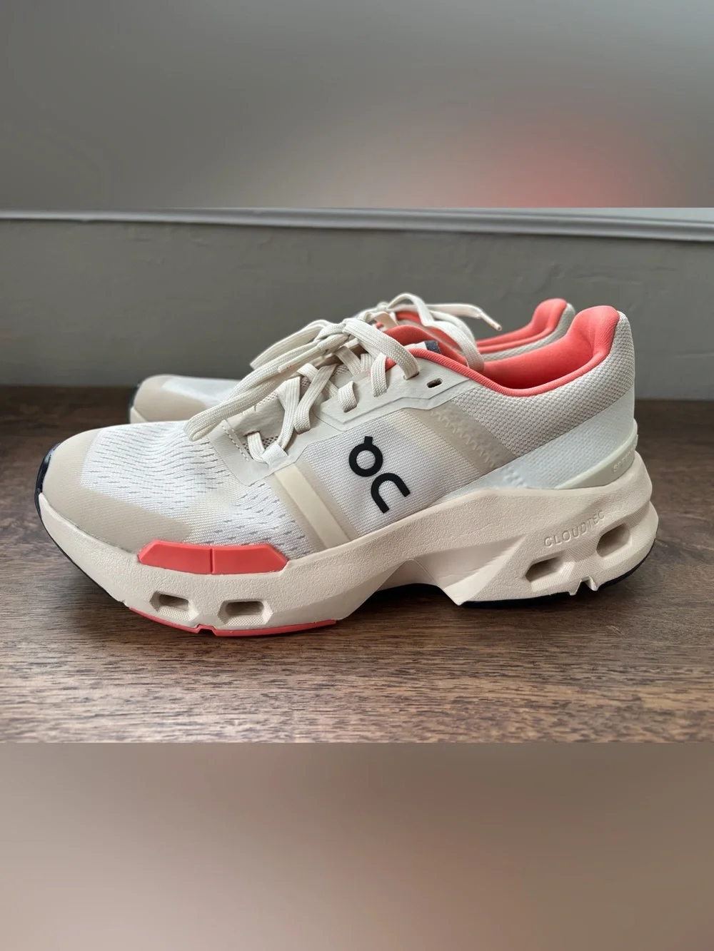 On Women's Cloudpulse Sneakers in Cream with Coral Lining